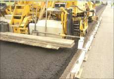 The recycled pavement on Highway 59 contained 2 percent virgin asphalt by weight – an amount that was continuously controlled by a computer.