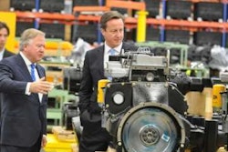 JCB chairman Sir Anthony Bamford shows the JCB Dieselmax engine to Prime Minister David Cameron during his visit to JCB.
