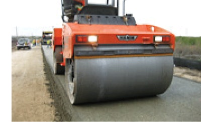 A Wirtgen/Hamm HD-120 tandem roller compacting concrete on a haul road in New Braunfels, Texas.