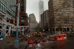 A jobsite in New York City sinks into a large hole. Credit: Allison Joyce, Getty Images