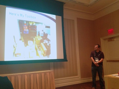 Scott Threet shows off his collection of construction gadgets