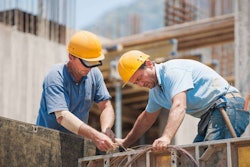 Two construction workers