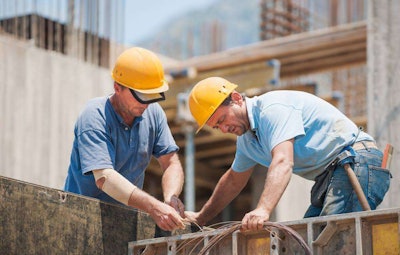Two construction workers