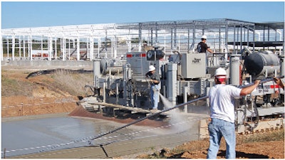 The crew used a Power Paver SF-3000 concrete slipform paver to extend Chad Colley Boulevard in Fort Smith, Arkansas.