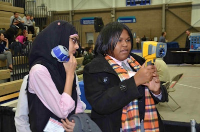 Students take part in a solar energy display.
