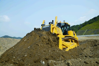 Komatsu’s D155AX-7 crawler dozer is powered by a 354-horsepower Tier 4 interim-compliant engine.
