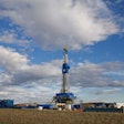 An oil rig is shown on near Williston, North Dakota. Oil extraction discoveries have led to rapid industrial development and job creation in the area. Tom Reichner / Shutterstock.com