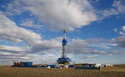 An oil rig is shown on near Williston, North Dakota. Oil extraction discoveries have led to rapid industrial development and job creation in the area. Tom Reichner / Shutterstock.com
