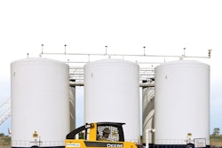 EnviroClean’s Deere CTL does clean up duty at a tank farm.