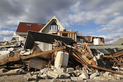 A destroyed beach house in the aftermath of Hurricane Sandy on November 4, 2012 in Far Rockaway, NY. Credit: Leonard Zhukovsky / Shutterstock.com