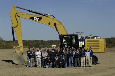 Teamwork: One of several teams working on the 336 E H project, taken at Cat’s Peoria proving grounds.
