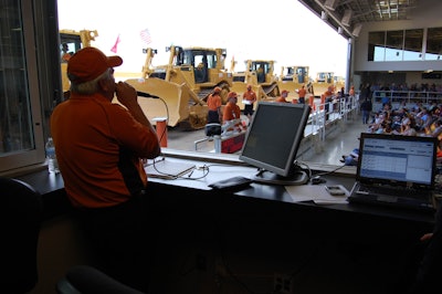 With simultaneous online bidding, the callers have to watch both the audience and their computer screens.