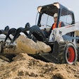 Bobcat S650 skid steer with industrial grapple