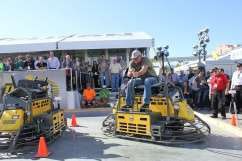 Wyatt Molzahn of Wyatt Molzahn Construction in Worland, Wyoming, turns a corner during his winning run in Wacker Neuson’s 2013 Trowel Challenge at World of Concrete in Las Vegas.