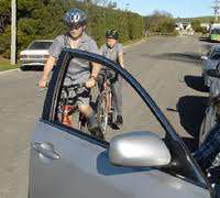 cyclist car door