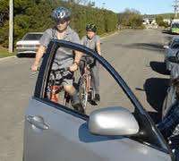 cyclist car door
