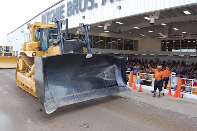 A dozer goes up for auction during a Ritchie Bros. event in Kissimmee, Florida. has brought in 9,500 pieces to be sold in an unreserved auction to some 1,800 bidders