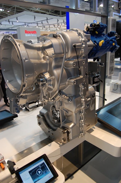The Rexroth Dana hydro-mechanical transmission with a Bosch Rexroth variable displacement pump (in blue) mounted on the end.