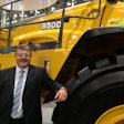 Bell’s Neville Paynter in front of North America’s largest articulated truck, the B50D