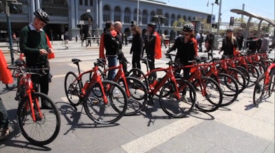 Media professionals test the Turbo bikes at the North American release.