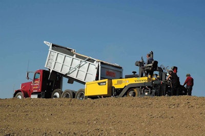 The Volvo PF2181 has an 8-foot screed, which transports with no permit, compared to 10-foot units.