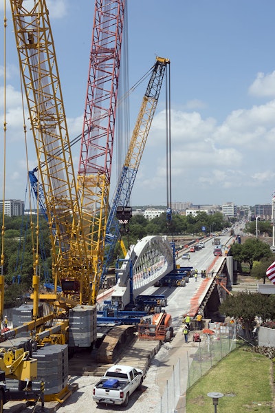 Massive cranes are needed to lift the cranes off the cribbing and place the segments, but the construction method will cut seven months out of what would have been a year long project.