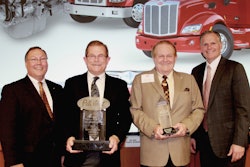 Peterbilt Motors Company presented Rush Peterbilt Truck Center – Nashville the award for Medium Duty Dealer of the Year. (Pictured, left to right: Robert Woodall, Peterbilt director of sales and marketing; Rusty Rush, Rush Enterprise; Marvin Rush, Rush Enterprise; and Bill Kozek, Peterbilt general manager and PACCAR vice president.