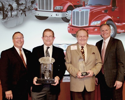 Peterbilt Motors Company presented Rush Peterbilt Truck Center – Nashville the award for Medium Duty Dealer of the Year. (Pictured, left to right: Robert Woodall, Peterbilt director of sales and marketing; Rusty Rush, Rush Enterprise; Marvin Rush, Rush Enterprise; and Bill Kozek, Peterbilt general manager and PACCAR vice president.