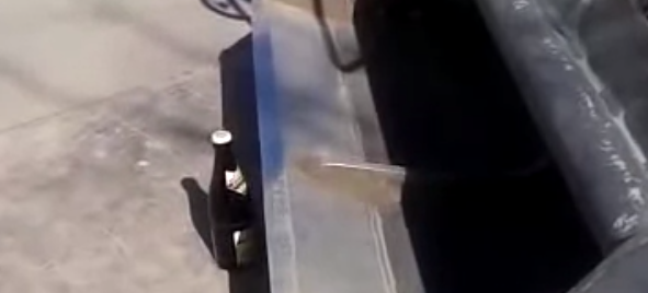 Compact excavator beer removal