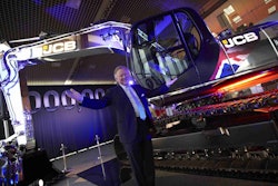 JCB Chairman Sir Anthony Bamford with the company’s 1 millionth machine, a JS220 tracked excavator.