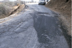 No patching can cure severe fatigue cracking, which indicates profound base failure; road ultimately was in-place foam-recycled with thin overlay.