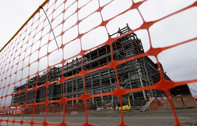 Workers are back on the job building a waste treatment plant in Richland, Washington after radioactive soil was found on the site. Credit: AP/Ted S. Warren