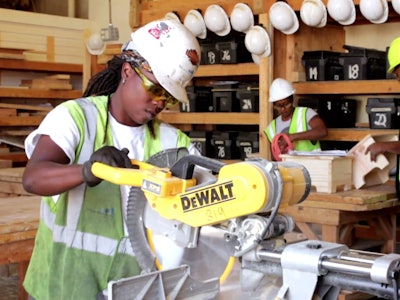 A trainee in the Women Wear Hard Hats Too construction training program in Minneapolis, Minnesota