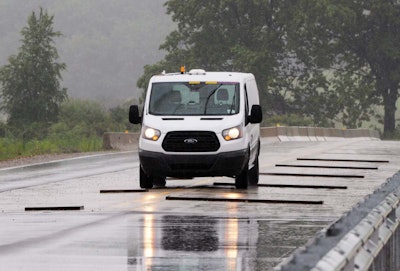 A Ford Transit van being robotically test driven.