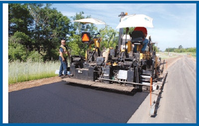 In Crow Wing County, Minn., warm mix asphalt containing Evotherm additive is placed in effort to minimize low-temperature thermal cracking while avoiding costly high-performance PG asphalt binder.