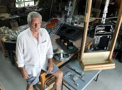 Robert Townsend, a Palm Beach County resident, created a hurricane-resistant traffic signal hanger that can withstand winds of up to 110 mph. The pivitol hangers are now standard on all new traffic signals in Florida. (Photo: Scott Fisher / Sun Sentinel)