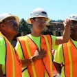 Students marvel at construction equipment at a jobsite in 2013 of the I-84 Sandy River Bridge in Oregon as part of a pre-apprenticeship program. Credit: Sunny Strader/The Oregonian