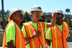 Students marvel at construction equipment at a jobsite in 2013 of the I-84 Sandy River Bridge in Oregon as part of a pre-apprenticeship program. Credit: Sunny Strader/The Oregonian