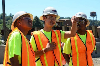 Students marvel at construction equipment at the I-84 Sandy River Bridge jobsite. Credit: Sunny Strader/The Oregonian