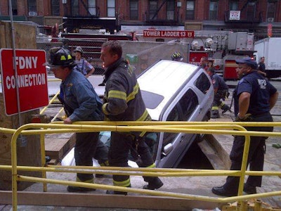 The SUV that crashed into the Second Avenue Subway construction site is seen at rest in a ditch. Credit: NBC 4 New York