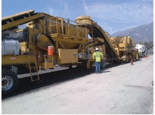 The Pavement Recycling Systems train with a Cat PR 1000 milling machine and a CRMX 2 mobile recycler from Nesbitt Contracting.