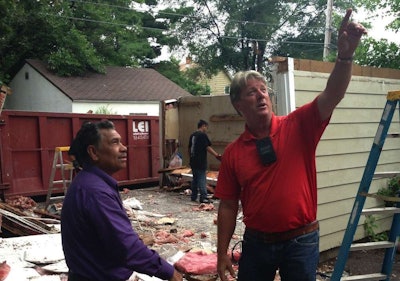 Charles Howerton on the jobsite wearing and using his ELSA device.