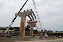 Crews work on a flyover ramp at the “Big Rock” I-630/I-430 interchange in August. (Photo: @AHTD / Twitter)