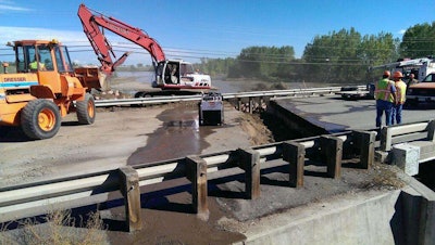 CDOT crews work to repair a bridge on State Highway 119 west of Intestate 25 on September 18, 2013. (Photo: @ColoradoDOT / Twitter)