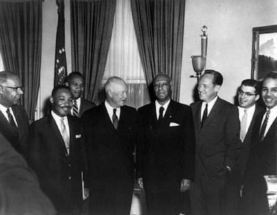 Eishenhower, center, with Martin Luther King Jr., left, and A. Phillip Randolph, right.