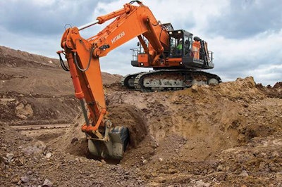 Excavators placed on a shelf, elevated from the dig site, are positioned for the best mass excavation production.