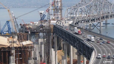 The eastern span of the Oakland-San Francisco Bay Bridge under construction. The bridge was opened to traffic on Labor Day last year.
