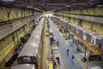 Amtrak employees work to manufacture and assemble the company’s new long distance cars at the CAF USA facility in Elmira, New York. (Photo: PRNewsFoto/Amtrak)