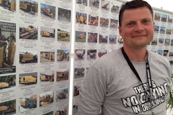 At ICUEE 2013, Bob Martin, HDD Broker’s general manager, stands in front of a listing of used drills available from his company.