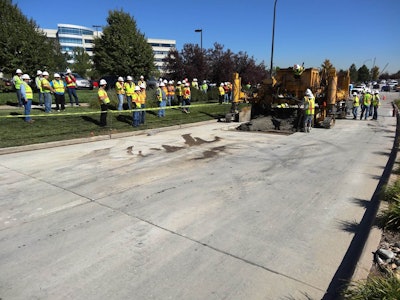 Workers pour concrete on a roadway in Highlands Ranch, Colorado. (Photo: Courtesy of International Grooving and Grinding Association/Douglas County Department of Public Works Engineering)